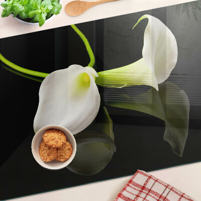 Schneidebrett Glas mit Lilienmotiv auf schwarzem Hintergrund