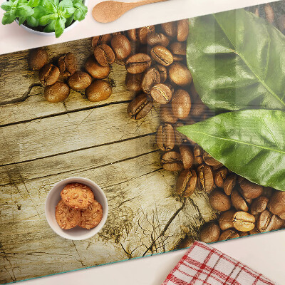 Schneidebrett glas Kaffee und Blätter