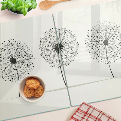 Schneidebrett Löwenzahn auf weißem Hintergrund