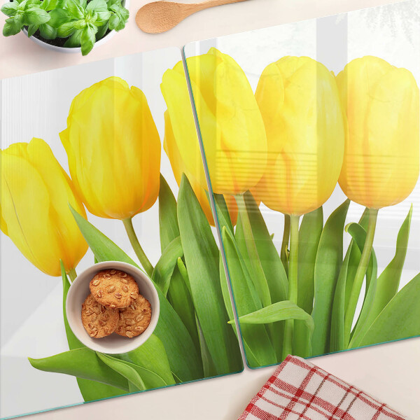 Schneidebrett Gelbe Tulpen auf grünem Hintergrund