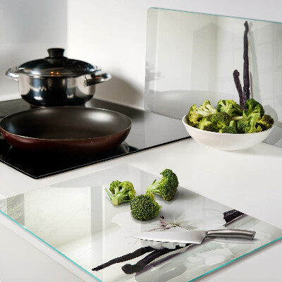 Schneidebrett Glas mit Motiv einer Blume an einem Zweig