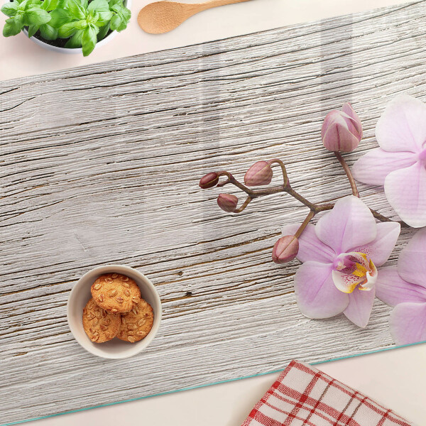 Schneidebrett Orchideen auf Holzgrund