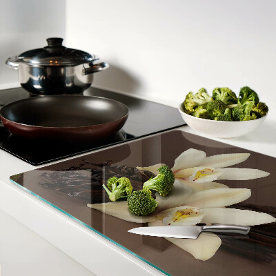 Glas schneidebrett Orchideen und Vanilleschoten