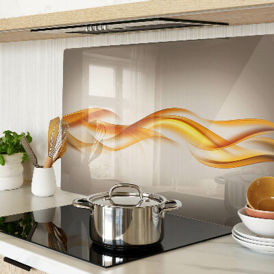 Schneidebrett Glas mit wellenförmigem Muster in Goldtönen