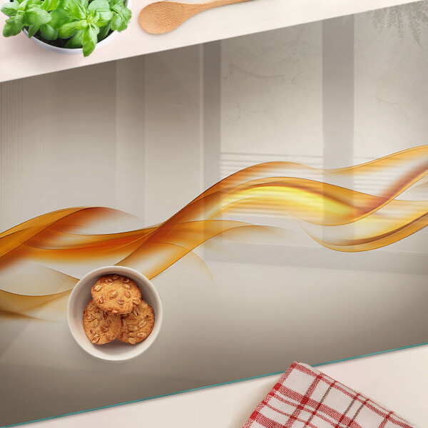 Schneidebrett glas Wellen in Goldtönen