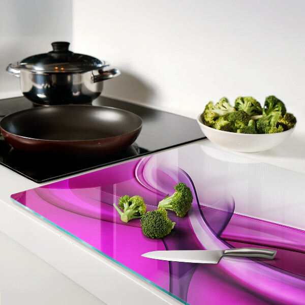 Glas-Schneidebrett mit Wellenmotiv in Rosatönen