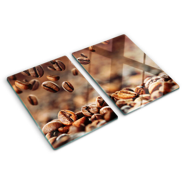 Schneidebrett mit Motiv „Kaffeebohnen in Bewegung”