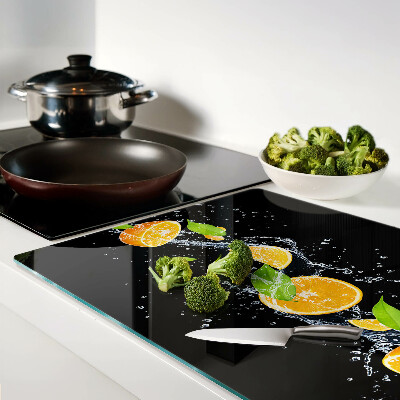 Schneidebrett mit Motiv von Zitrusfrüchten in Wasser