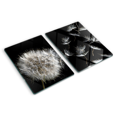 Schneidebrett Glas mit Löwenzahnmotiv auf schwarzem Hintergrund