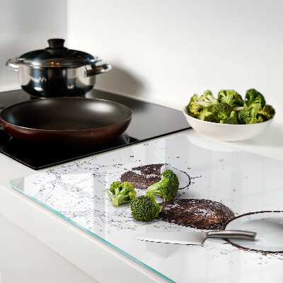 Schneidebrett mit Motiv von Kokosnüssen im Wasser