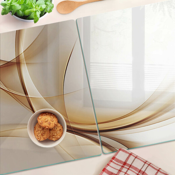 Schneidebrett Glas mit abstraktem Wellenmuster in Beigetönen