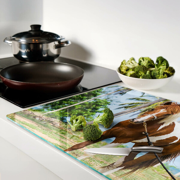 Schneidebrett glas Ein Pferd vor Palmen im Hintergrund