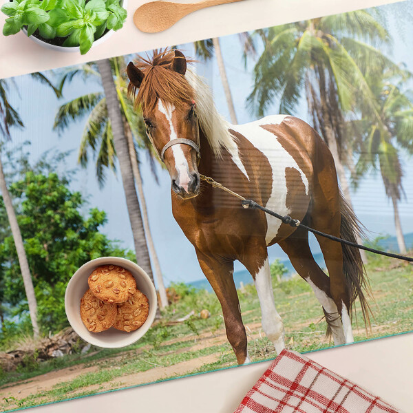 Schneidebrett Glas mit Motiv eines Pferdes vor Palmen im Hintergrund