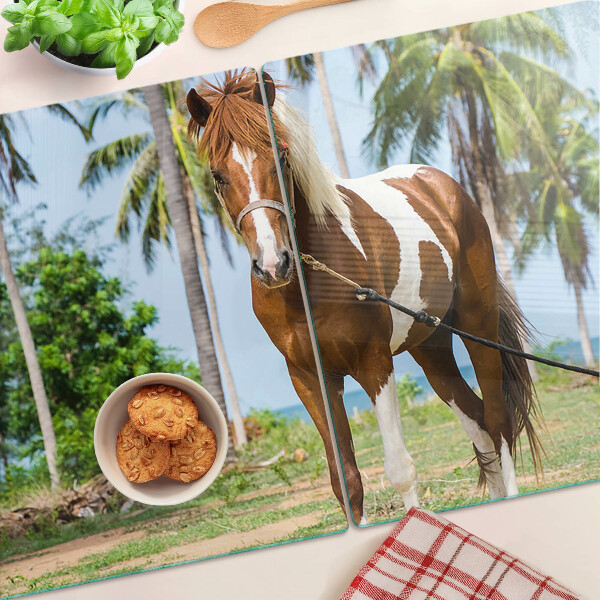 Schneidebrett Glas mit Motiv eines Pferdes vor Palmen im Hintergrund