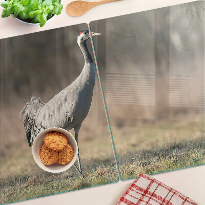 Schneidebrett Glas mit Motiv eines Krans vor einer Landschaft