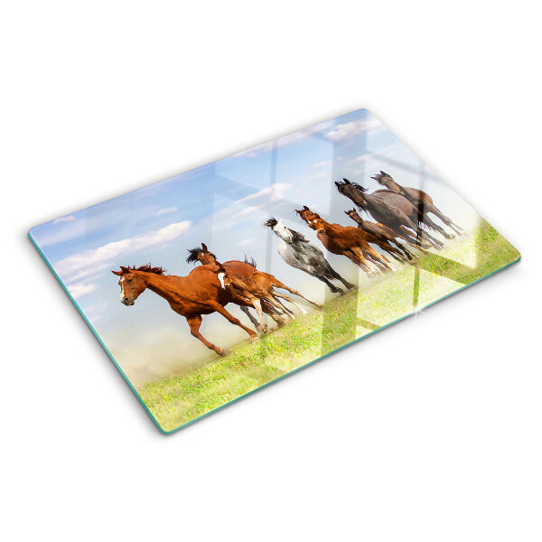 Schneidebrett mit Motiv galoppierender Pferde auf der Wiese