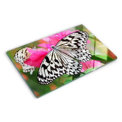 Glas schneidebrett Schmetterling auf Blumen