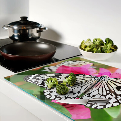 Glas schneidebrett Schmetterling auf Blumen