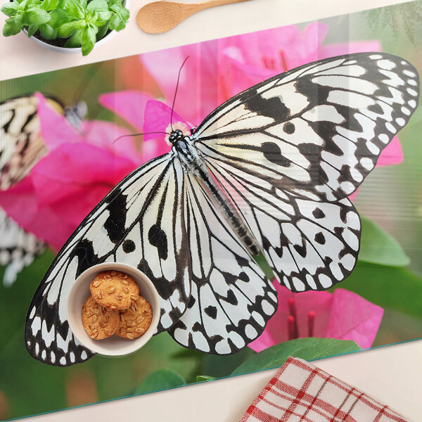 Glas-Schneidebrett mit Schmetterling auf Blumenmotiv