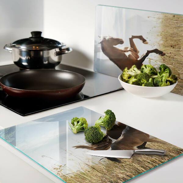 Schneidebrett Glas mit einem Motiv von Pferden auf einer sonnigen Wiese