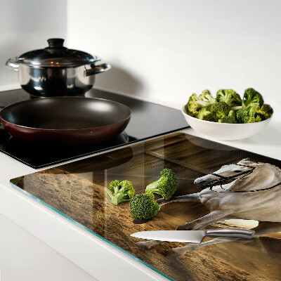 Glas-Schneidebrett mit Motiv eines sich bewegenden Pferdes im Stall