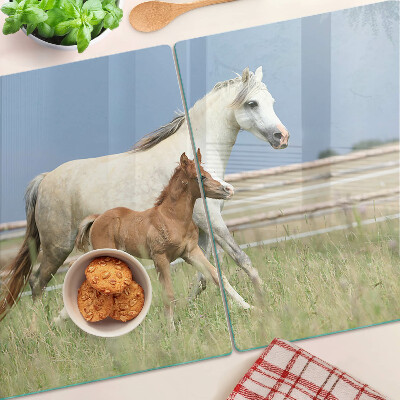 Schneidebrett Glas mit Motiv eines Pferdes und seines Fohlens auf einer Wiese