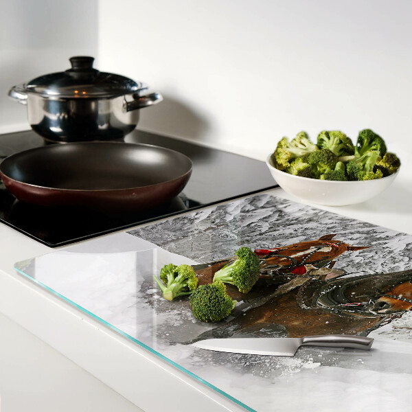 Glas schneidebrett Kaltblüter im Schnee