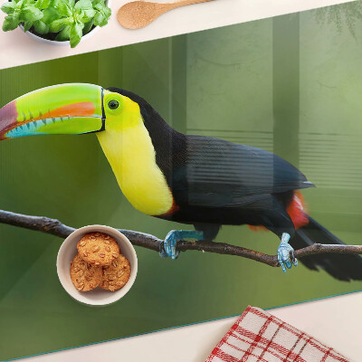 Schneidebrett mit Motiv eines Tukans auf einem Ast