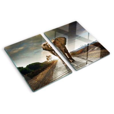 Schneidebrett Glas mit Motiv eines Elefanten auf der Straße bei Sonnenuntergang