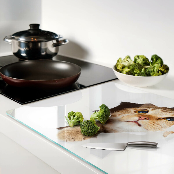 Schneidebrett mit Motiv einer Katze, die durch ein Loch in der Wand schaut