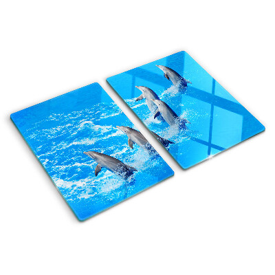 Schneidebrett glas Delfine, die über Wellen springen