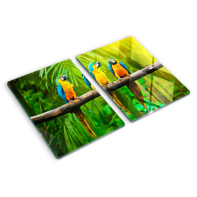 Schneidebrett mit Motiv Papageien auf einem Ast in tropischer Umgebung