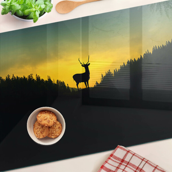Schneidebrett Hirsche vor der untergehenden Sonne
