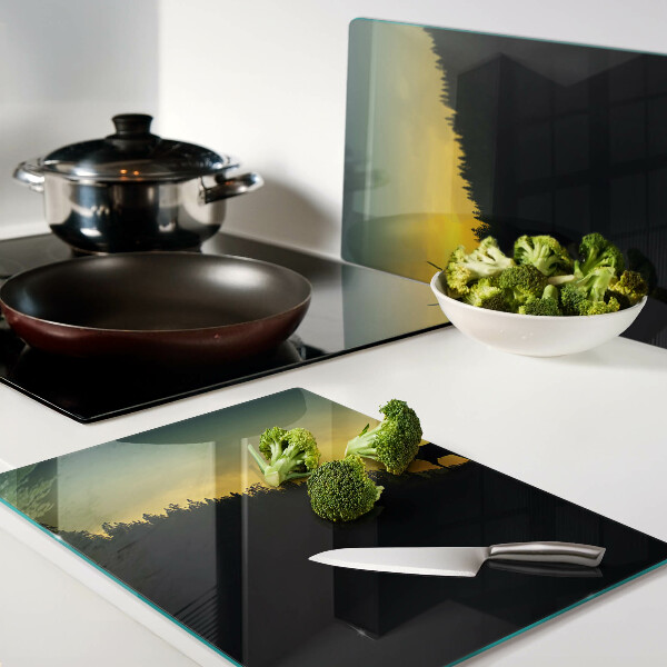 Schneidebrett mit Motiv von Hirschen vor einer untergehenden Sonne