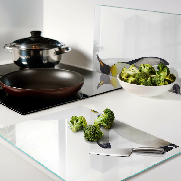 Schneidebrett Glas mit Motiv eines Pinguins auf dem Eis