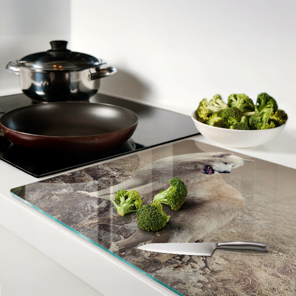 Schneidebrett mit Motiv eines Wolfes auf einem felsigen Berg