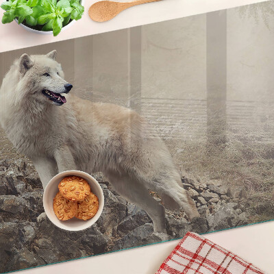 Schneidebrett mit Motiv eines Wolfes auf einem felsigen Berg