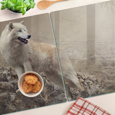 Schneidebrett mit Motiv eines Wolfes auf einem felsigen Berg