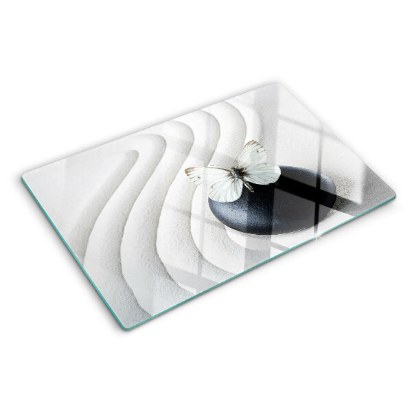Schneidebrett Glas mit Schmetterlingsmotiv auf Steinhintergrund