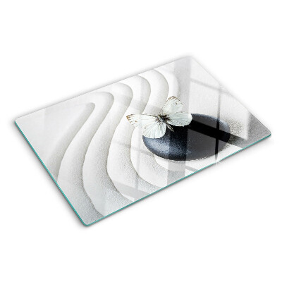 Schneidebrett Glas mit Schmetterlingsmotiv auf Steinhintergrund