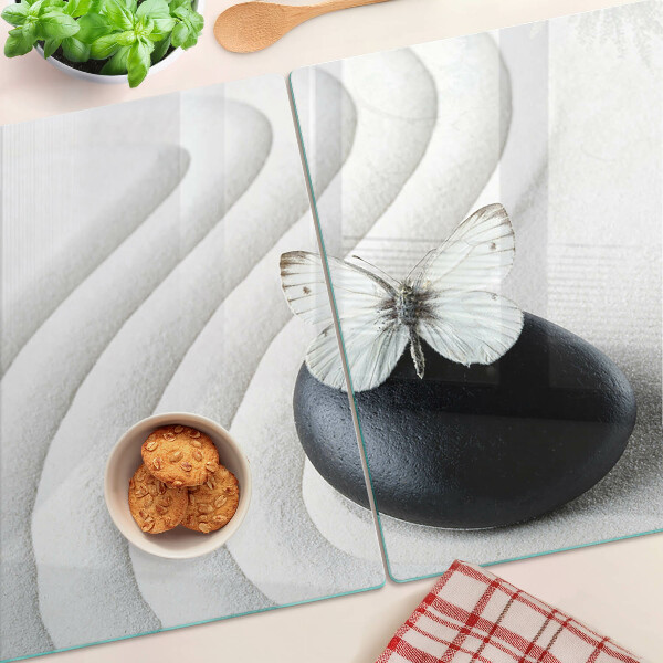 Schneidebrett glas Schmetterlingsmotiv auf Stein