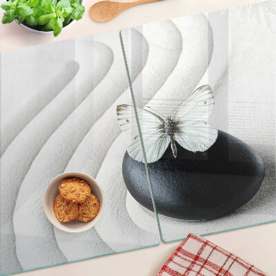 Schneidebrett Glas mit Schmetterlingsmotiv auf Steinhintergrund