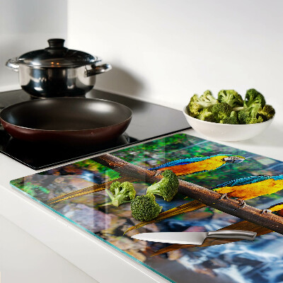 Schneidebrett Glas mit Motiv Papageien auf einem Ast in einem tropischen Wald