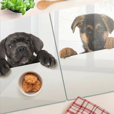 Schneidebrett mit Motiv zweier Hunde, die sich umschauen