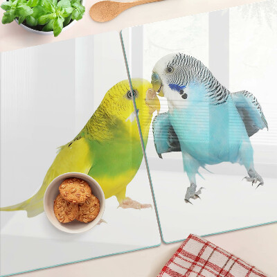 Schneidebrett Glas mit gelbem und blauem Papageienmotiv