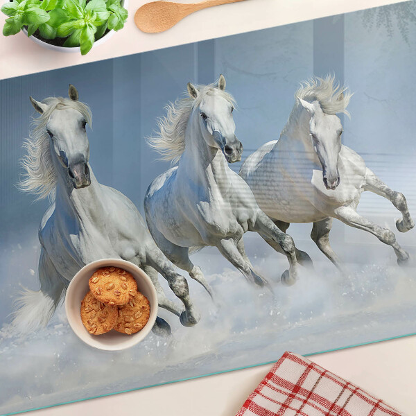 Schneidebrett mit Motiv galoppierender weißer Pferde
