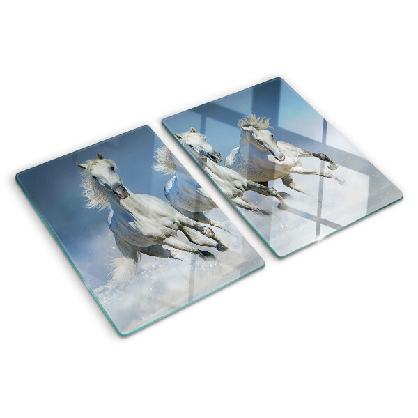 Schneidebrett galoppierende weiße Pferde