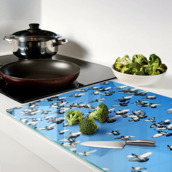 Schneidebrett Glas mit Motiv von Tauben, die am Himmel fliegen