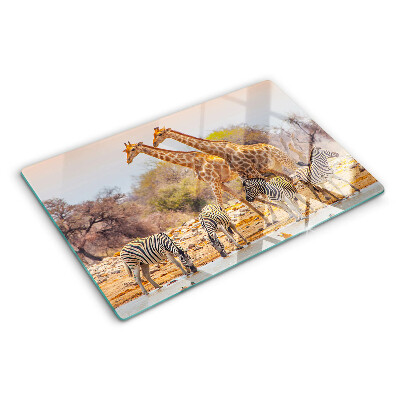 Glas-Schneidebrett mit Motiv von Zebras und Giraffen in ihrem natürlichen Lebensraum