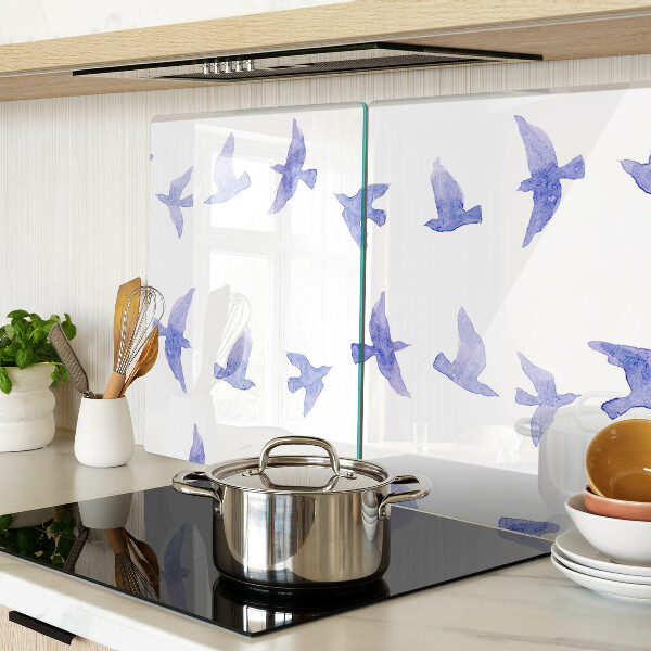 Glas-Schneidebrett mit einem Motiv aus Vögeln in Blautönen